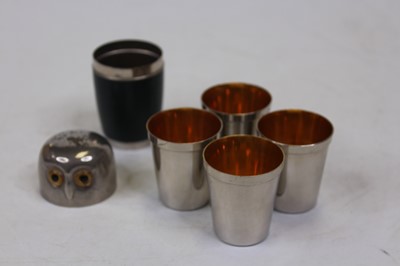 Lot 375 - A set of four chrome travelling spirit cups,...