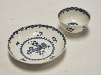Lot 244 - An 18th century Worcester tea bowl and saucer,...