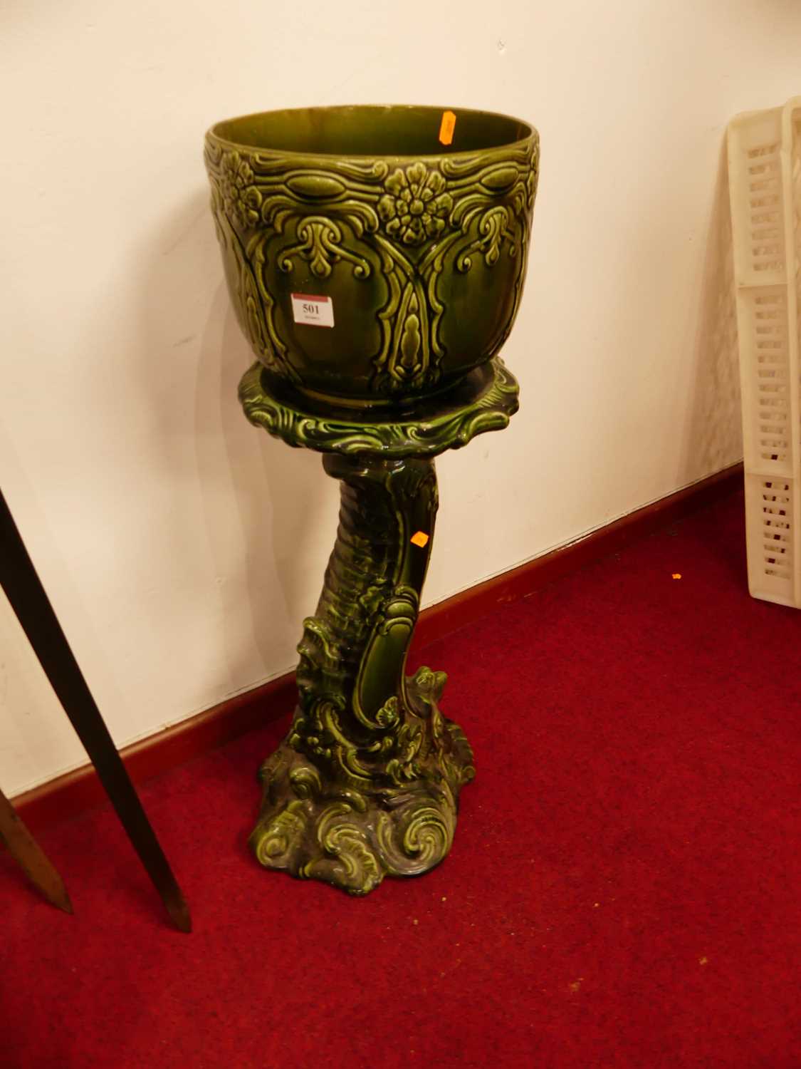 Lot 501 - A Victorian green glazed jardiniere on stand,...