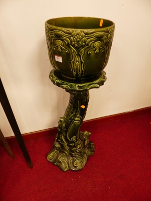 Lot 501 - A Victorian green glazed jardiniere on stand,...