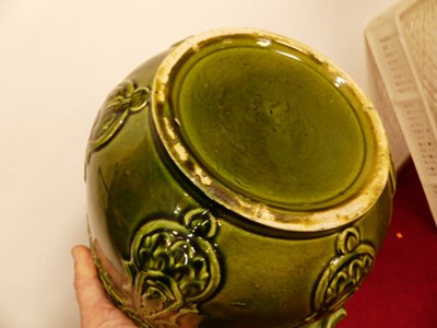 Lot 501 - A Victorian green glazed jardiniere on stand,...