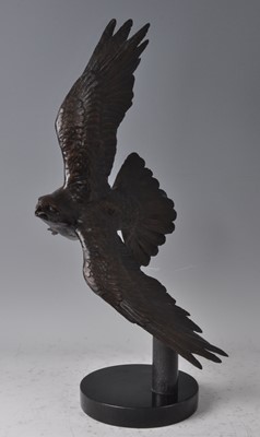 Lot 205 - Simon Dyer - a large bronze falcon, in flying...