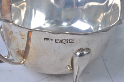 Lot 95 - A pair of 1930s silver sauceboats, each with...