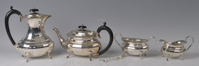 Lot 107 - An Art Deco silver four-piece tea and coffee...
