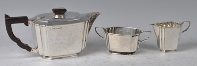 Lot 108 - An Art Deco silver three-piece tea set,...