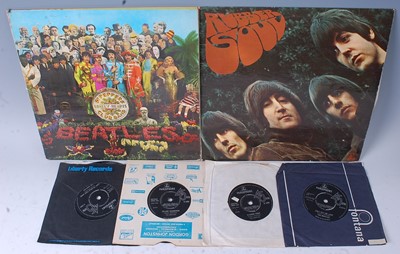 Lot 844 - The Beatles, a collection of six LP's to...