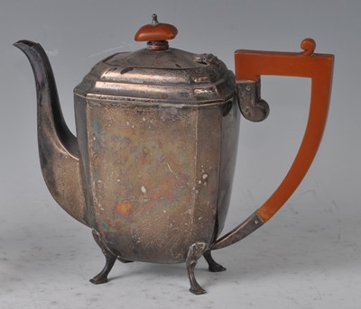 Lot 117 - An Art Deco silver coffee pot, having bakelite...