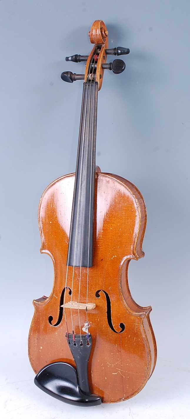 Lot 512 - A 20th century violin, having a two piece...