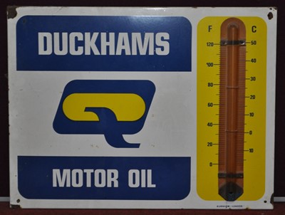 Lot 245 - An enamel on metal thermometer advertising...