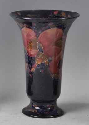 Lot 39 - A Moorcroft Pomegranate pattern pottery vase,...
