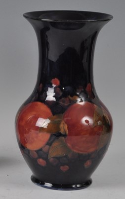 Lot 40 - A Moorcroft Pomegranate pattern pottery vase,...