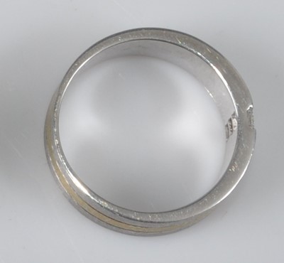 Lot 1149 - A yellow and white metal satin finish three...