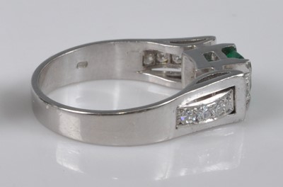 Lot 1130 - A white metal, synthetic emerald and diamond...