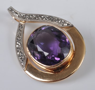 Lot 1139 - A yellow and white gold amethyst pendant,...