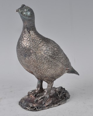 Lot 1041 - A modern silver and loaded model of a grouse...