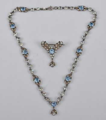 Lot 1132 - An Edwardian white metal paste set necklace...