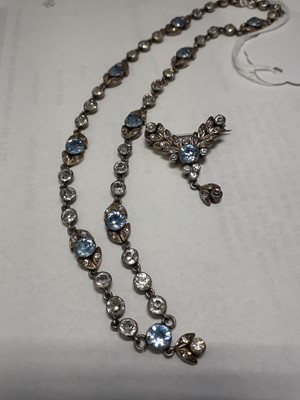 Lot 1132 - An Edwardian white metal paste set necklace...