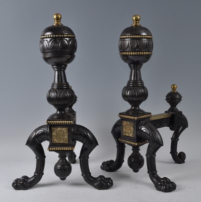 Lot 1198 - A pair of Victorian cast iron and brass fire...