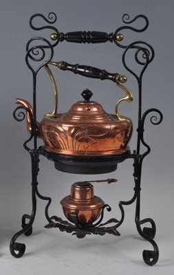 Lot 167 - An Art Nouveau copper and brass spirit burner...