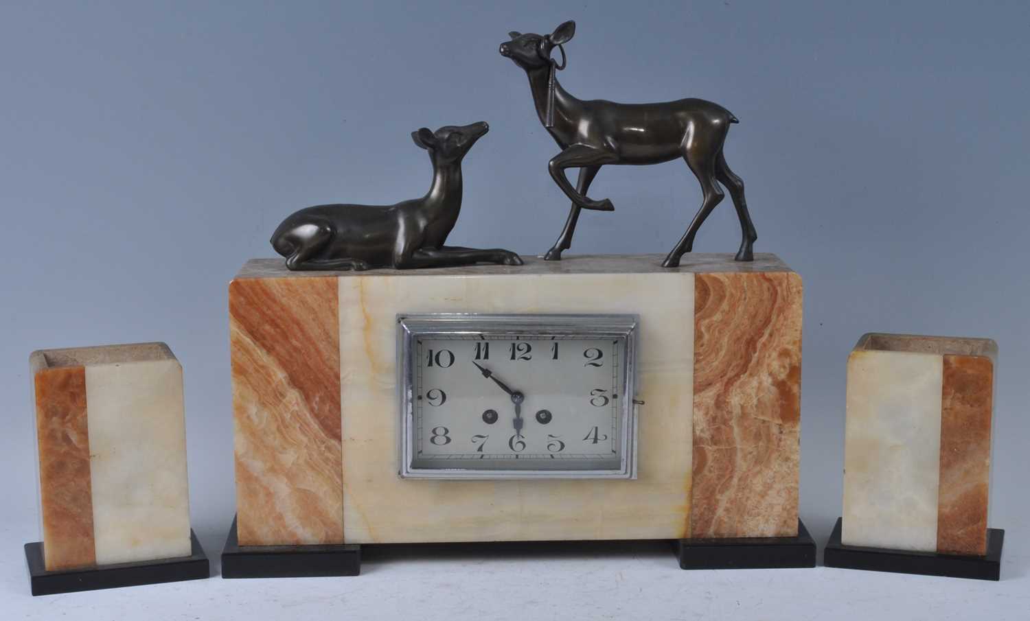 Lot 160 - An Art Deco marble and onyx mantel clock,...