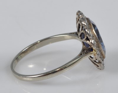 Lot 1118 - A white metal, synthetic sapphire and diamond...