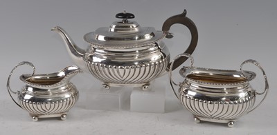 Lot 1085 - An Edwardian silver three-piece tea set,...