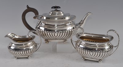 Lot 1085 - An Edwardian silver three-piece tea set,...