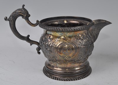 Lot 1084 - A George III silver-gilt cream jug, of good...