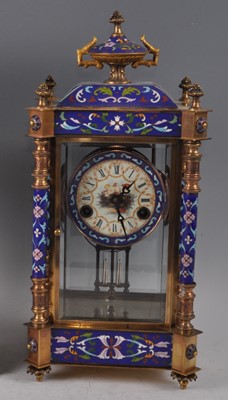 Lot 1335 - A reproduction gilt brass and enamel four...