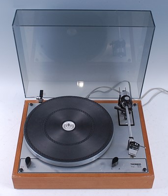 Lot 553 - A Thorens TD 166 turntable, in a teak case...