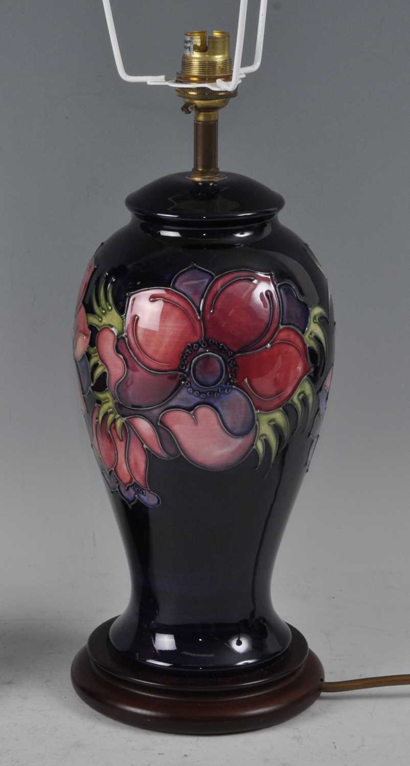 Lot 14 - A Moorcroft pottery table lamp, in the Anemone...