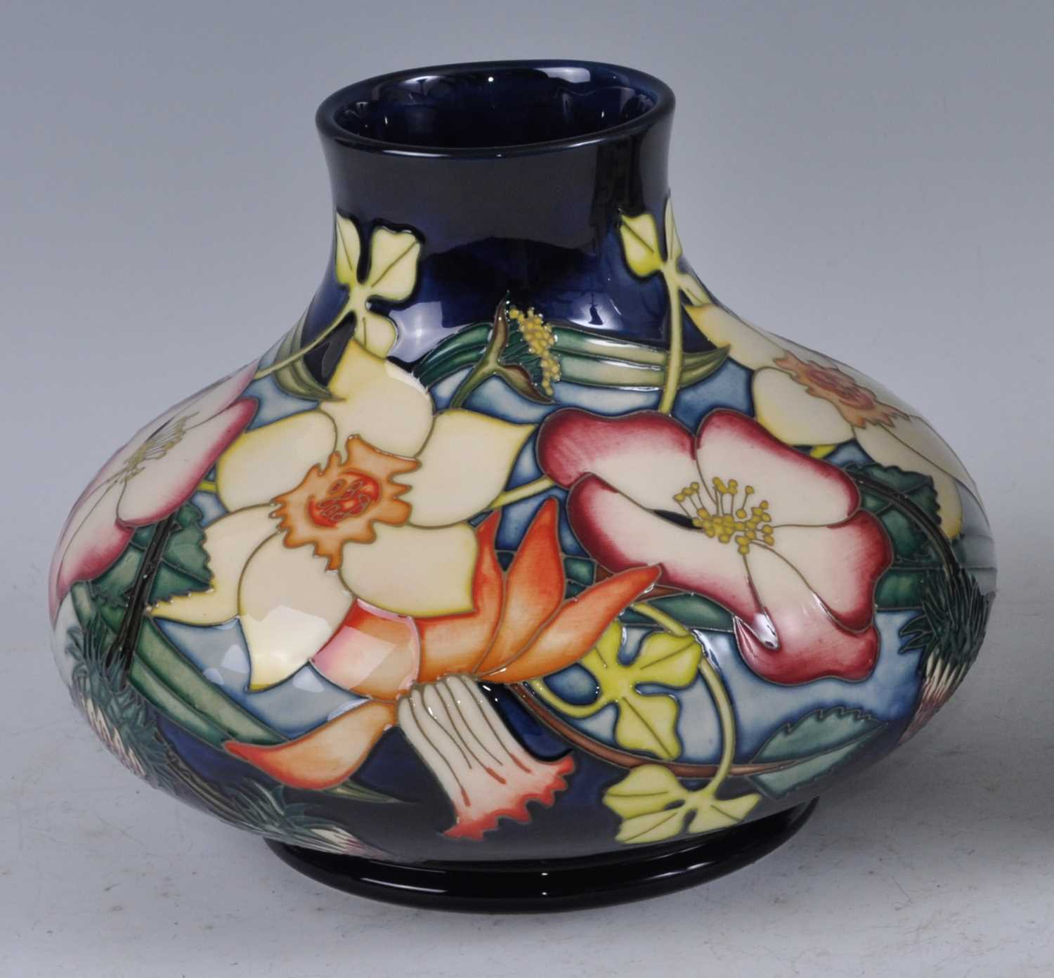 Lot 20 - A Moorcroft pottery squat vase, in the...