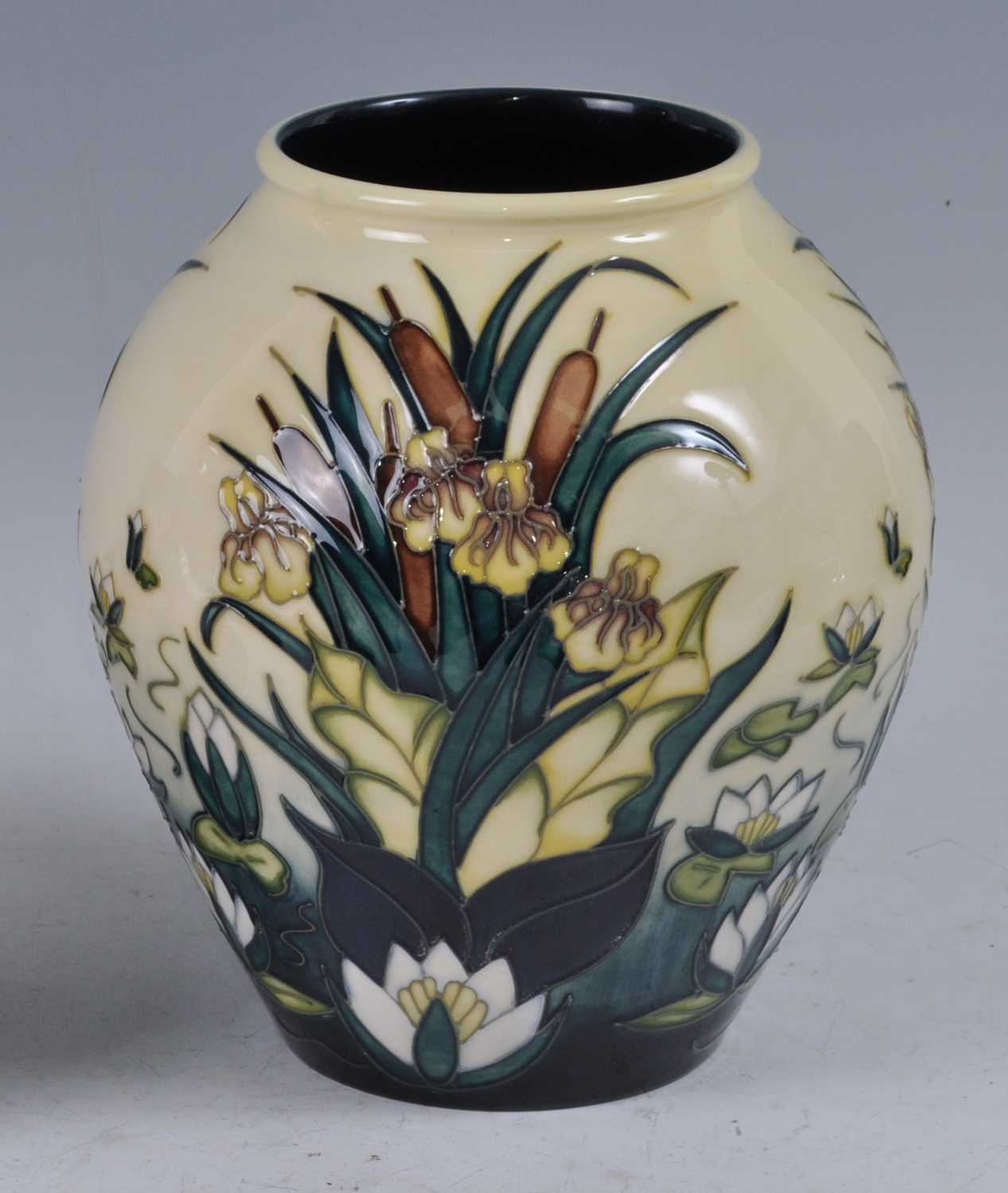 Lot 21 - A Moorcroft pottery vase, in the Lamia pattern...