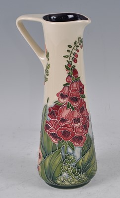 Lot 26 - A Moorcroft pottery ewer, in the Amberwood...