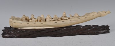Lot 1239 - A Japanese Meiji period tusk carving as seven...