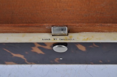 Lot 1203 - An Edwardian tortoiseshell table cigarette box...