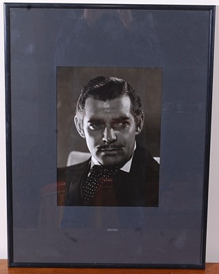 Lot 684 - Clark Gable, (1901-1960), a black and white...