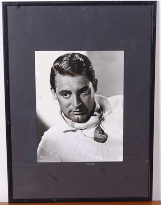 Lot 685 - Cary Grant, (1904-1986) a black and white...
