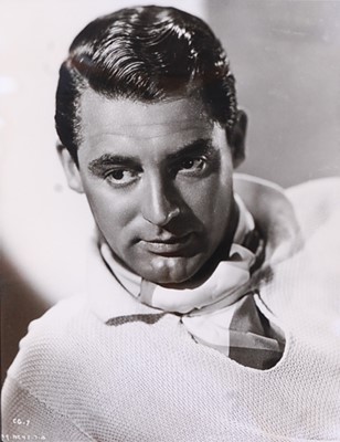 Lot 685 - Cary Grant, (1904-1986) a black and white...