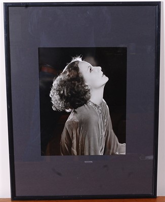 Lot 686 - Greta Garbo, (1905-1990), a black and white...