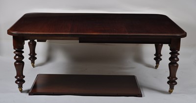 Lot 1411 - A Victorian mahogany extending dining table,...