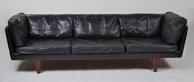 Lot 450 - A 1960s Danish four-seater black leather long...