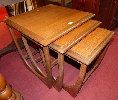 Lot 448 - G-Plan - a 1960s nest of three teak occasional...