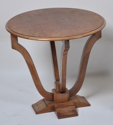 Lot 387 - An Art Deco figured walnut pedestal tilt-top...