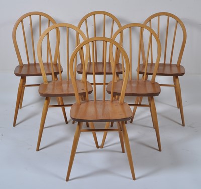 Lot 417 - A set of six Ercol blond elm stickback kitchen...