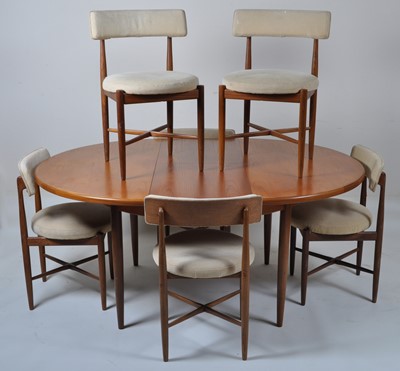 Lot 453 - A 1960s G-Plan teak dining suite, comprising;...