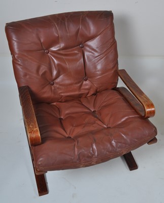 Lot 465 - A 1960s Danish formed laminate and tan leather...