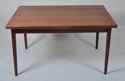 Lot 456 - A 1960s Danish teak drawleaf dining...