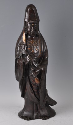 Lot 1231 - A Chinese bronze Guanyin, Qing dynasty...