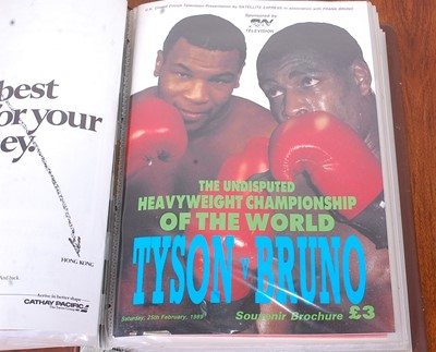 Lot 746 - A folder of boxing programmes, to include The...